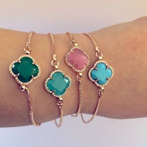 FOUR new, never worn bracelets